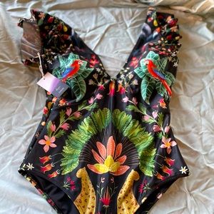 Brand new, tag on. Averie ruffle top one piece swimsuit. Full coverage
